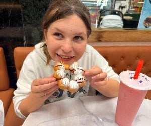 girl eating mochi donut
